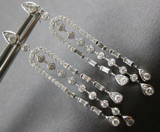 LONG 1.25CT DIAMOND 14KT WHITE GOLD ROUND & BAGUETTE HORSESHOE HANGING EARRINGS