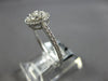 ESTATE .52CT DIAMOND 18KT WHITE GOLD ROUND 3D FLOWER HALO FRIENDSHIP LOVE RING