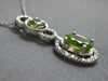 1.97CT DIAMOND & AAA PERIDOT 14KT WHITE GOLD OVAL & ROUND HALO FLOATING PENDANT