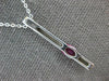 1.22CT DIAMOND & AAA RUBY 14KT WHITE GOLD OVAL & ROUND BAR LOVE FLOATING PENDANT
