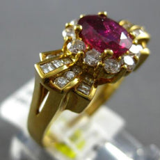 1.57CT DIAMOND & AAA RUBY 18KT YELLOW GOLD 3D ROUND & BAGUETTE ENGAGEMENT RING
