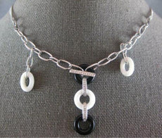 .11CT DIAMOND & AAA ONYX & WHITE AGATE 18KT WHITE GOLD LOVE KNOT LARIAT NECKLACE
