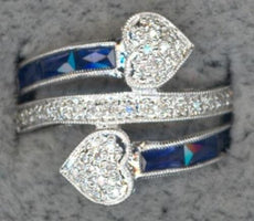 1.08CT DIAMOND & AAA SAPPHIRE 14KT WHITE GOLD ROUND & BAGUETTE CRISS CROSS RING