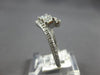 .63CT DIAMOND 14KT WHITE GOLD 3D PRINCESS & ROUND 2 STONE CRISS CROSS LOVE RING
