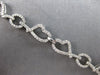 ESTATE 1.38CT DIAMOND 18KT WHITE GOLD 3D MULTI HEART LOVE KNOT TENNIS BRACELET