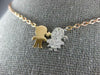 ESTATE .16CT DIAMOND 18KT WHITE & ROSE GOLD 3D BABY BOY & GIRL FUN NECKLACE