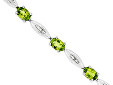 5.4CT DIAMOND & AAA PERIDOT 14KT WHITE GOLD 3D OVAL & BAGUETTE TENNIS BRACELET