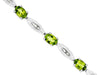 5.4CT DIAMOND & AAA PERIDOT 14KT WHITE GOLD 3D OVAL & BAGUETTE TENNIS BRACELET