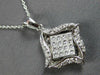.52CT DIAMOND 18KT WHITE GOLD ROUND & PRINCESS INVISIBLE SQUARE FLOATING PENDANT