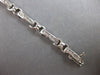 ESTATE LONG 2.60CT DIAMOND 14KT WHITE GOLD ROUND CHANNEL X LOVE TENNIS BRACELET