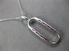 .74CT DIAMOND & AAA RUBY 14K WHITE GOLD 3D BAGUETTE & ROUND FUN FLOATING PENDANT