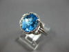 3.34CT DIAMOND & AAA BLUE TOPAZ 14KT WHITE GOLD OVAL & ROUND FUN LOVE KNOT RING
