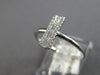 ESTATE .21CT DIAMOND 14KT WHITE GOLD 3D CLASSIC ROUND & BAGUETTE BAR FUN RING