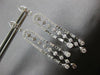 LONG 1.25CT DIAMOND 14KT WHITE GOLD ROUND & BAGUETTE HORSESHOE HANGING EARRINGS