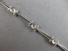 .26CT DIAMOND 14KT WHITE GOLD ROUND BEZEL ETOILE TRIANGULAR FUN TENNIS BRACELET