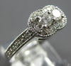 .54CT DIAMOND 14KT WHITE GOLD CLASSIC ROUND 2 STONE HALO FILIGREE FUN LOVE RING