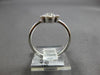 .56CT DIAMOND 18KT WHITE GOLD ROUND & PRINCESS 5 STONE FLOWER FILIGREE LOVE RING