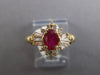 1.05CT DIAMOND & AAA RUBY 14K YELLOW GOLD OVAL ROUND & BAGUETTE FLOWER LOVE RING