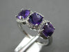 1.57CT DIAMOND & AAA AMETHYST 14KT WHITE GOLD CUSHION & ROUND 3 STONE HALO RING