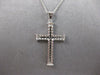 .45CT DIAMOND 14KT WHITE GOLD 3D ROUND & BAGUETTE 3 ROW CROSS FLOATING PENDANT