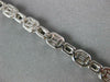 4.54CT DIAMOND 18K WHITE GOLD ROUND & EMERALD CUT SQUARE OCTAGON TENNIS BRACELET