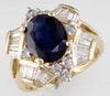 4.35CT DIAMOND & AAA SAPPHIRE 14KT YELLOW GOLD ROUND & BAGUETTE ENGAGEMENT RING