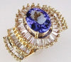 4.50CT DIAMOND & AAA TANZANITE 14KT YELLOW GOLD OVAL & BAGUETTE ENGAGEMENT RING