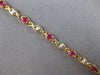2.66CT DIAMOND & AAA RUBY 14KT YELLOW GOLD ROUND & OVAL XO LOVE TENNIS BRACELET