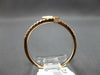 .32CT DIAMOND 14KT ROSE GOLD ROUND & PRINCESS INVISIBLE SQUARE CRISS CROSS RING