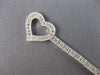 ESTATE .75CT DIAMOND 14KT WHITE GOLD 3D OPEN HEART LOVE KNOT TENNIS BRACELET