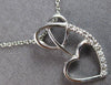 ESTATE .03CT DIAMOND 14KT WHITE GOLD 3D DOUBLE HEART LOVE FLOATING PENDANT