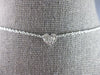 .12CT DIAMOND 14K WHITE GOLD ROUND & BAGUETTE INVISIBLE HEART SHAPE LOVE PENDANT