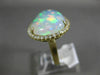 ESTATE EXTRA LARGE 8.13CT DIAMOND & AAA OPAL 14KT YELLOW GOLD CLASSIC HALO RING