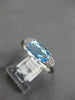 ESTATE 1.22CT DIAMOND & AAA BLUE TOPAZ 14KT WHITE GOLD CUSHION & ROUND FUN RING