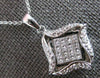 .52CT DIAMOND 18KT WHITE GOLD ROUND & PRINCESS INVISIBLE SQUARE FLOATING PENDANT