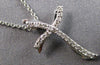 ESTATE SMALL .12CT DIAMOND 14KT WHITE GOLD 3D CLASSIC CROSS FLOATING PENDANT