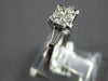 .50CT DIAMOND 18KT WHITE GOLD PRINCESS & BAGUETTE 3D INVISIBLE ENGAGEMENT RING