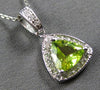 .90CT DIAMOND & AAA PERIDOT 14KT WHITE GOLD 3D TRILLION & ROUND FLOATING PENDANT