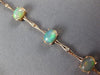 5.12CT DIAMOND & AAA OPAL 14KT ROSE GOLD OVAL & ROUND BAMBOO TENNIS BRACELET