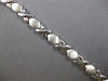 ESTATE WIDE 14KT WHITE GOLD 3D CLASSIC MATTE & SHINY XO LOVE BRACELET