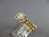 .22CT DIAMOND 14KT YELLOW GOLD ROUND & BAGUETTE INVISIBLE SQUARE LOVE KNOT RING