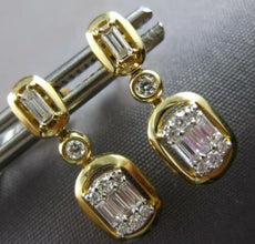 ESTATE .29CT DIAMOND 14KT YELLOW GOLD 3D ROUND & BAGUETTE HANGING EARRINGS