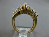 1.40CT DIAMOND 14KT 2 TONE GOLD 3D ROUND AND BAGUETTE MULTI ROW CRISS CROSS RING