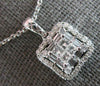 ESTATE .60CT DIAMOND 14KT WHITE GOLD ROUND PRINCESS & BAGUETTE FLOATING PENDANT