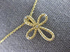 ESTATE .03CT DIAMOND 14KT YELLOW GOLD 3D CLASSIC INFINITY CROSS FLOATING PENDANT