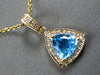1.05CT DIAMOND & AAA BLUE TOPAZ 14K WHITE GOLD TRILLION & ROUND HALO FUN PENDANT