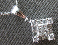 .53CT DIAMOND 18KT WHITE GOLD ROUND & PRINCESS INVISIBLE SQUARE FLOATING PENDANT