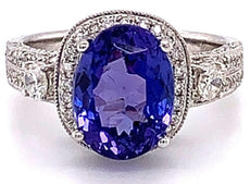 5.13CT DIAMOND & AAA TANZANITE 18KT WHITE GOLD 3D OVAL & ROUND ENGAGEMENT RING