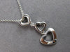 .06CT DIAMOND 14KT WHITE GOLD 3D OPEN HEART JOURNEY PAST PRESENT FUTURE PENDANT