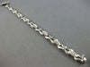 .59CT DIAMOND 14KT WHITE GOLD 3D ROUND 3 STONE XO FILIGREE LOVE TENNIS BRACELET